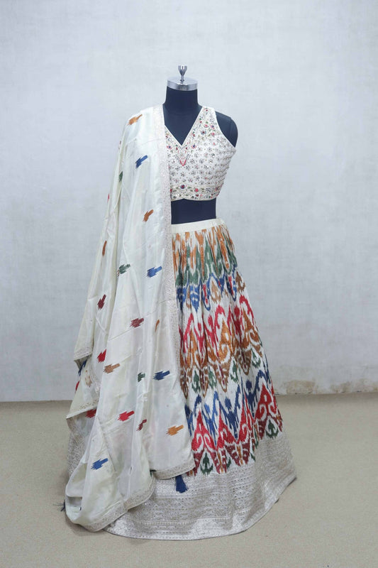 Ivory Mirror Work Embroidered Blouse with Multicolor Ikat Print Lehenga and Silk Dupatta - Mangaldeep NX