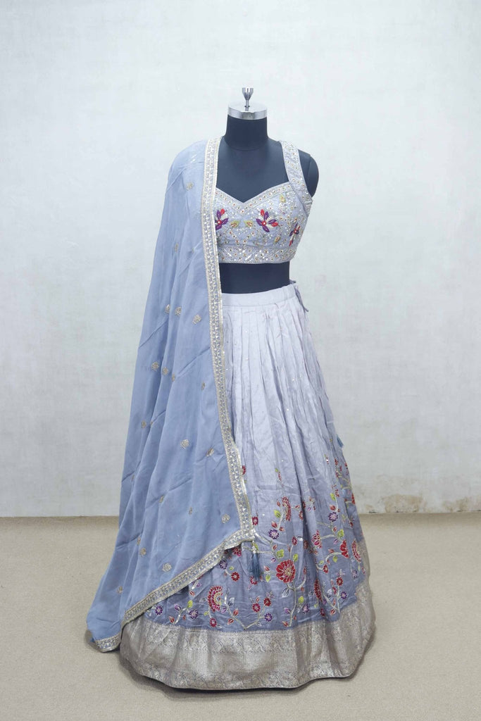 Lavender Embroidered Silk Lehenga Choli with Floral Thread Work and Blue Net Dupatta - Mangaldeep NX