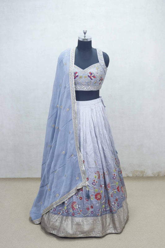 Lavender Embroidered Silk Lehenga Choli with Floral Thread Work and Blue Net Dupatta - Mangaldeep NX