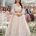 Elegant White Net Embroidered Bridal Lehenga Choli with Full Sleeves for Wedding
