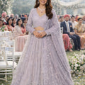 Stylish Lavender Net Embroidered Bridal Lehenga Choli with Full Sleeves for Wedding
