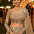 Luxury Beige Net Beads Work Bridal Lehenga Choli with Designer Dupatta