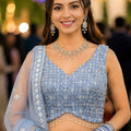 Stylish Sky Blue Net Embroidered Lehenga Choli with Designer Dupatta for Wedding