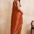 Rust Orange Georgette Saree with Silver Zari Border Butti Work
