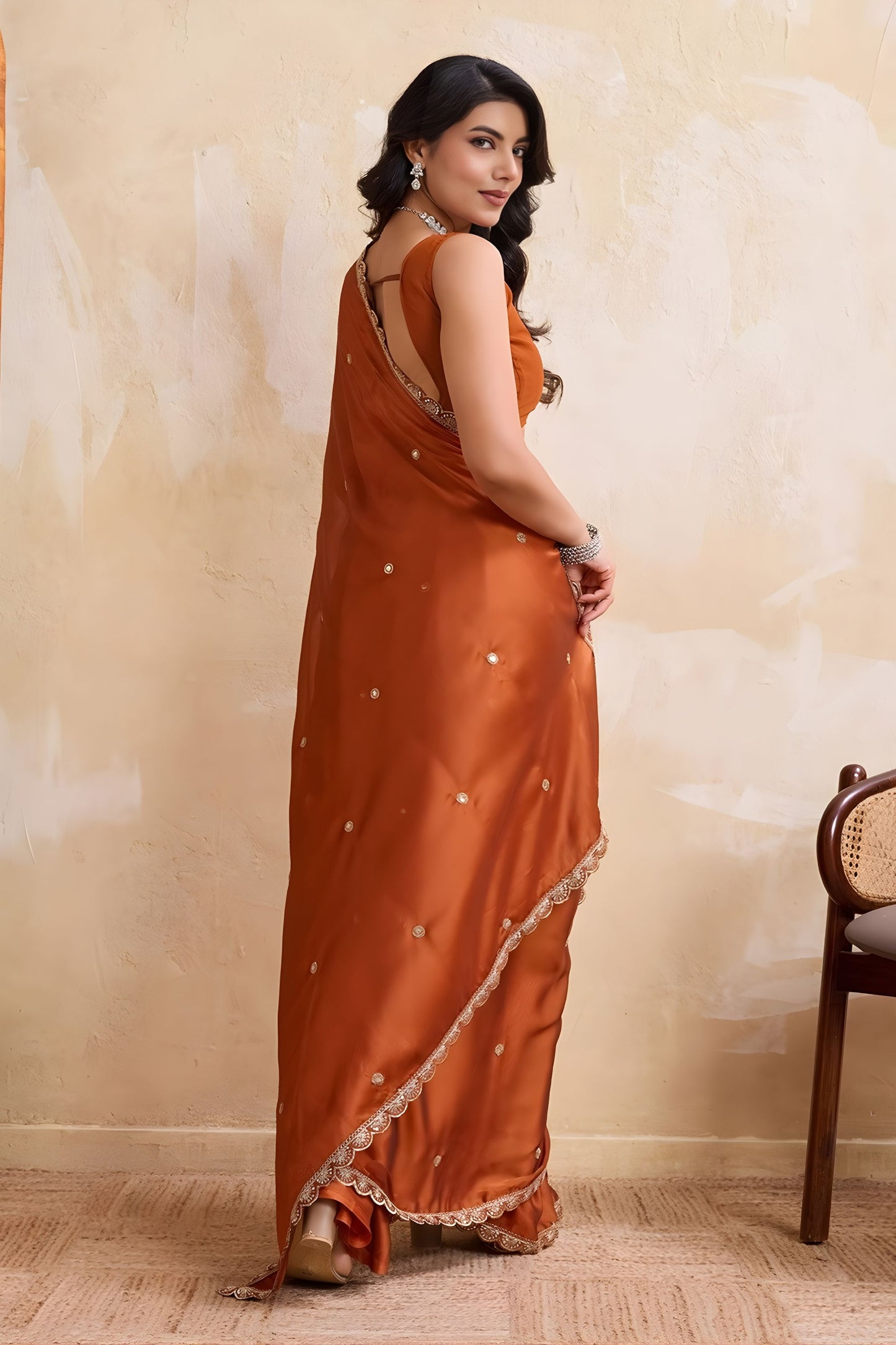 Rust Orange Georgette Saree with Silver Zari Border Butti Work