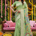 Pastel Green Silk Saree Multicolor Peacock Floral Print Zari Border