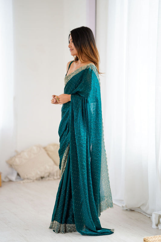 Teal Green Designer Georgette Saree with Heavy Golden Embroidered Border