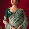 Designer Mint Green Silk Organza Saree with Heavy Embroidery Border