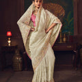 Off-White Silk Saree with Heavy Border Contrast Pink Blouse