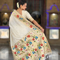 Off White Floral Woven Linen Silk Saree with Designer Peacock Border