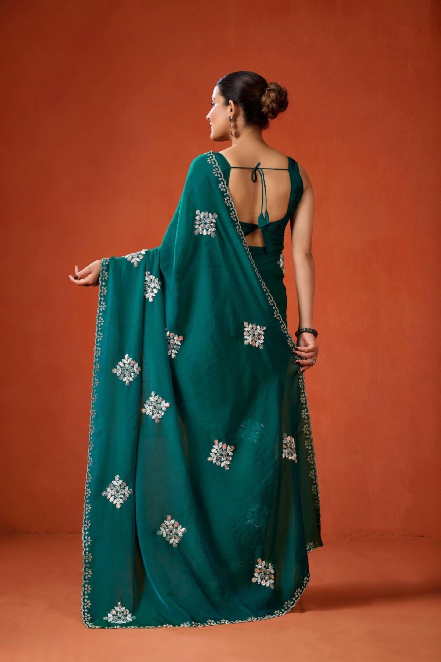Teal Green Embroidered Georgette Saree Floral Motifs Designer Border
