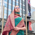 Elegant Teal Patola Print Silk Saree with Rich Maroon Zari Border