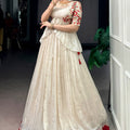 Trendy Off White Chocolate Silk Embroidered Lehenga Choli with Red Border for Women