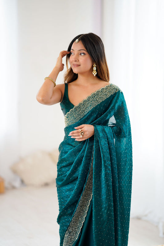 Teal Green Designer Georgette Saree with Heavy Golden Embroidered Border