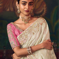 Off-White Silk Saree with Heavy Border Contrast Pink Blouse