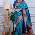 Teal Blue Kanjivaram Silk Saree with Gold Zari Border Butti Work