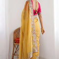 Mustard Yellow Tissue Silk Saree with Heavy Floral Embroidered Border