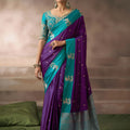 Purple Silk Saree with Contrast Teal Blue Zari Border Traditional