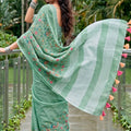 Mint Green Linen Cotton Saree Multicolor Floral Embroidery Tassel Pallu