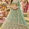 Exquisite Pista Green Fancy Fabric Heavy Embroidered Designer Lehenga Choli with Dupatta for Women