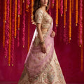 Elegant Cream Viscose Designer Lehenga Choli with Pink Dupatta and Beads Work for Women