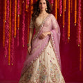 Elegant Cream Viscose Designer Lehenga Choli with Pink Dupatta and Beads Work for Women
