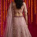 Mesmerizing Dusty Pink Net Designer Lehenga Choli with Beads Work and Dupatta for Women