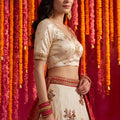Radiant Cream Viscose Designer Lehenga Choli with Beads Work and Dupatta for Women