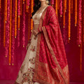 Radiant Cream Viscose Designer Lehenga Choli with Beads Work and Dupatta for Women