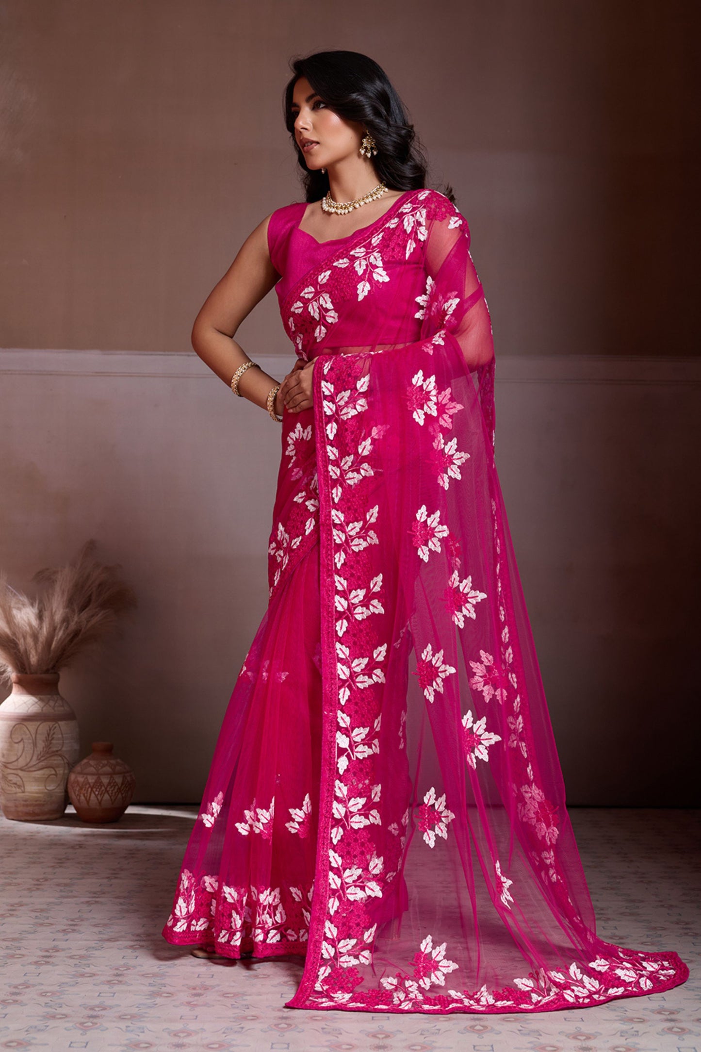 Rani Pink Embroidered Net Saree White Floral Sleeveless Designer Blouse