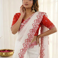 Elegant White Organza Saree with Red Embroidered Border