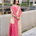 Cream And Pink Patola Print Saree with Intricate Border Festive Wear