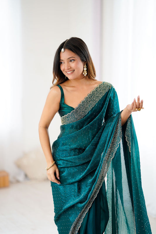 Teal Green Designer Georgette Saree with Heavy Golden Embroidered Border