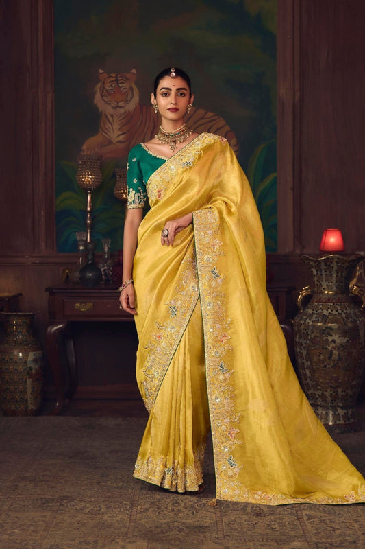 Mustard Yellow Silk Saree with Heavy Border and Green Contrast Blouse –