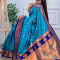Teal Blue Kanjivaram Silk Saree with Gold Zari Border Butti Work