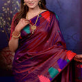 Wine Banarasi Silk Saree with Zari Woven Pallu Multicolor Ikat Design