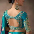 Purple Silk Saree with Contrast Teal Blue Zari Border Traditional