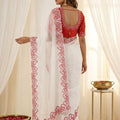 Elegant White Organza Saree with Red Embroidered Border