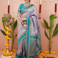 Lavender Silk Saree with Teal Woven Border Traditional Design