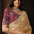 Golden Designer Saree with Heavy Embroidered Border Maroon Blouse