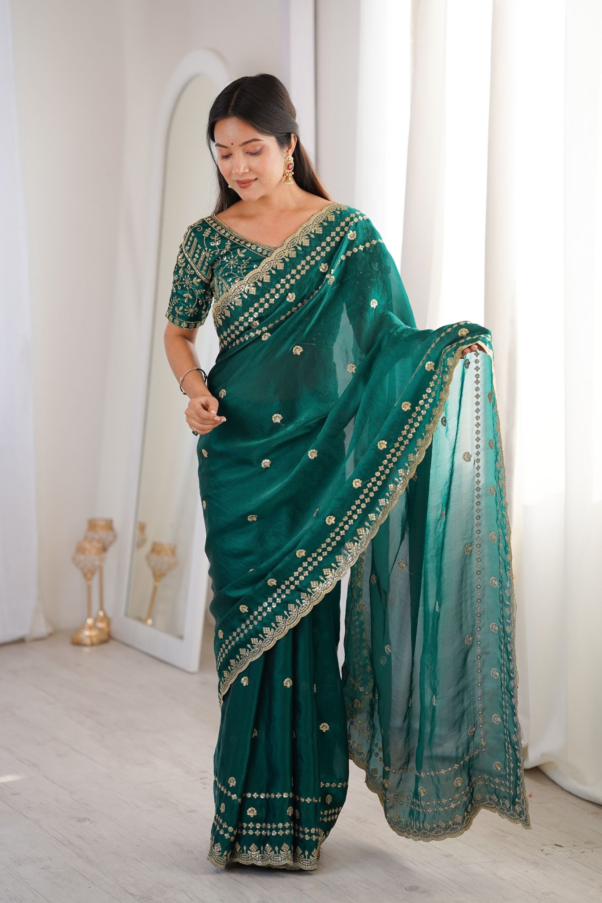 Luxury Teal Green Organza Silk Saree with Golden Embroidered Border