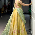 Elegant Mustard Yellow Embroidered Silk Lehenga Choli with Mint Green Dupatta for Women