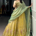 Elegant Mustard Yellow Embroidered Silk Lehenga Choli with Mint Green Dupatta for Women