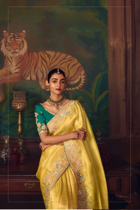 Mustard Yellow Silk Saree with Heavy Border and Green Contrast Blouse –