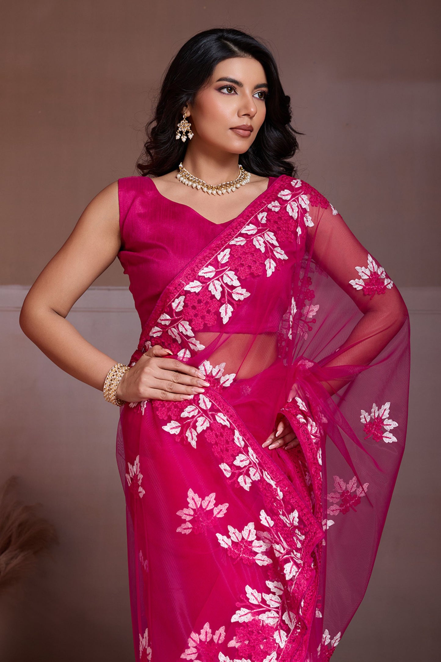 Rani Pink Embroidered Net Saree White Floral Sleeveless Designer Blouse