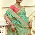 Sea Green Silk Saree with Antique Gold Zari Motifs Contrast Pink Blouse