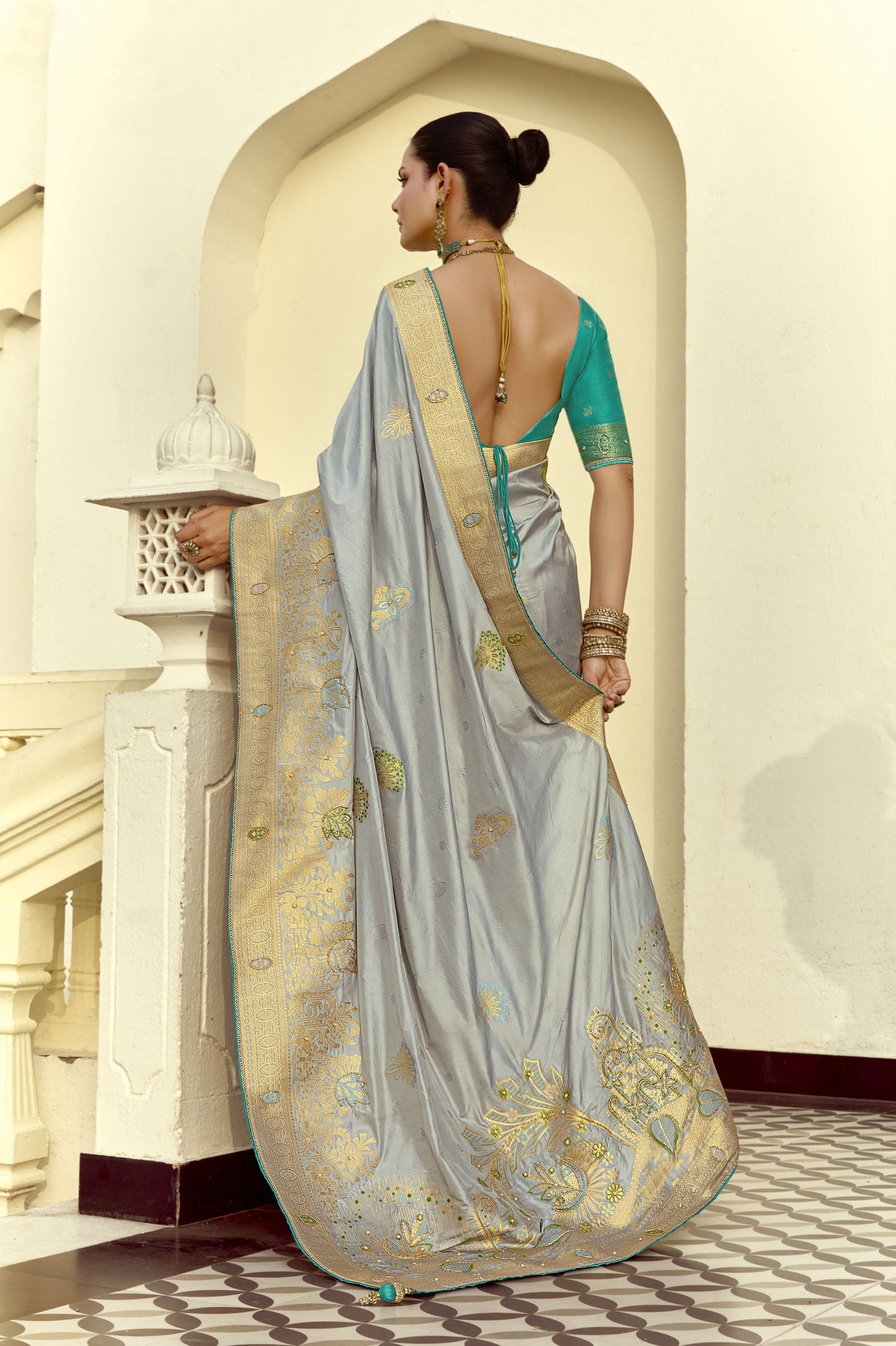 Grey Silk Saree with Rich Gold Zari Embroidery Contrast Teal Blouse