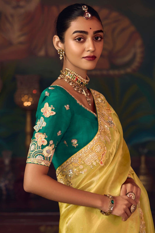 Mustard Yellow Silk Saree with Heavy Border and Green Contrast Blouse –