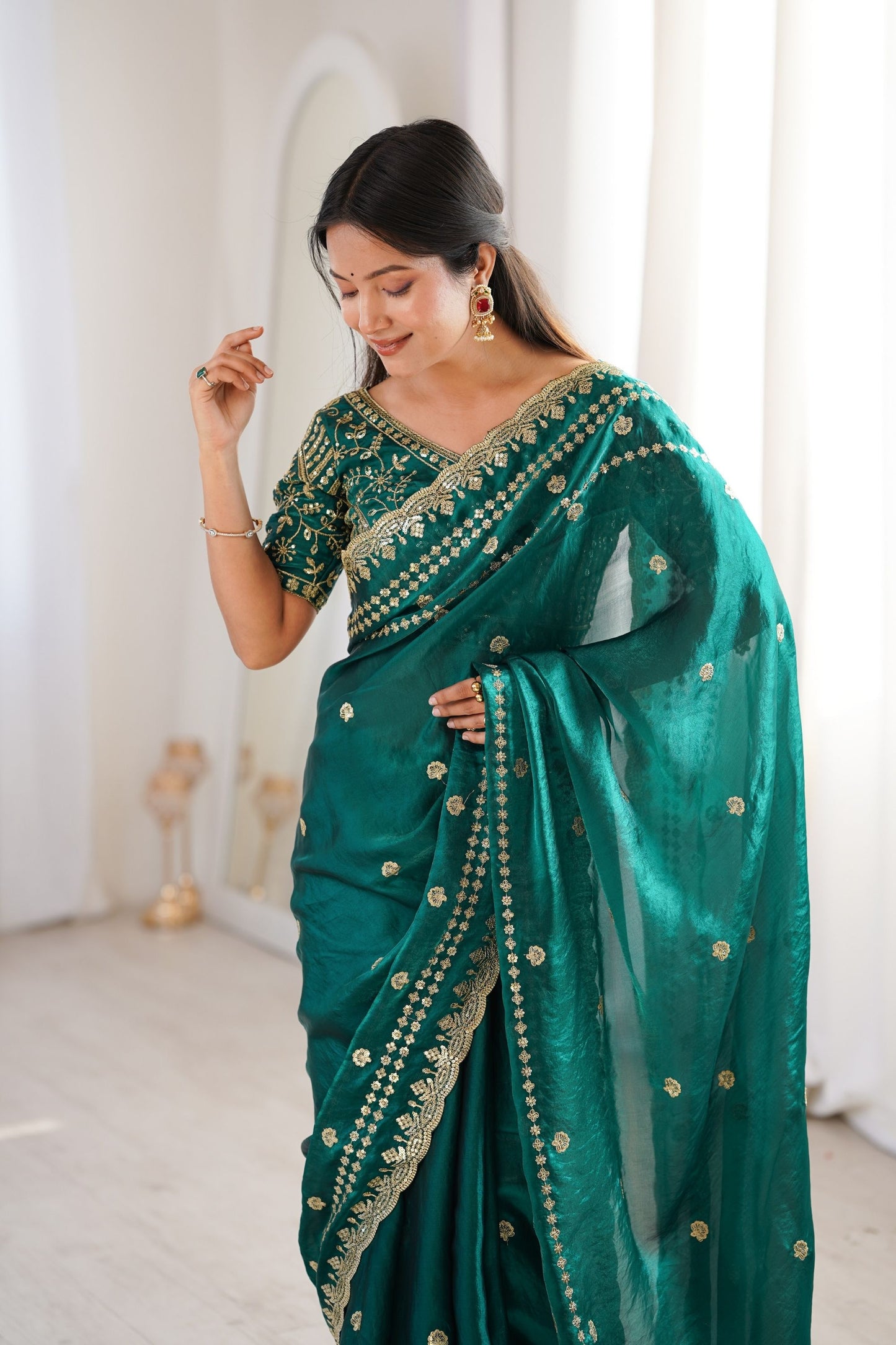 Luxury Teal Green Organza Silk Saree with Golden Embroidered Border