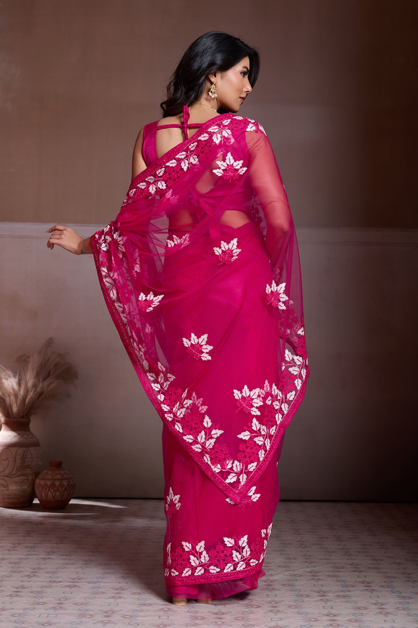 Rani Pink Embroidered Net Saree White Floral Sleeveless Designer Blouse